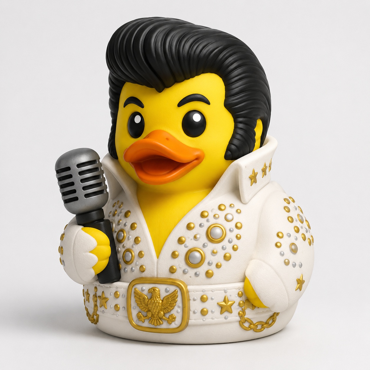King of Rock duck in white jeweled jumpsuit with gold accents holding a vintage silver microphone