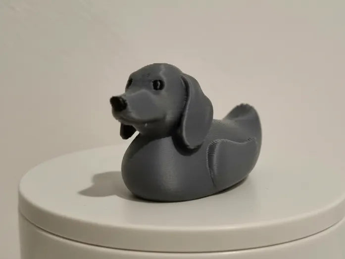 Black Dachshund figurine with floppy ears