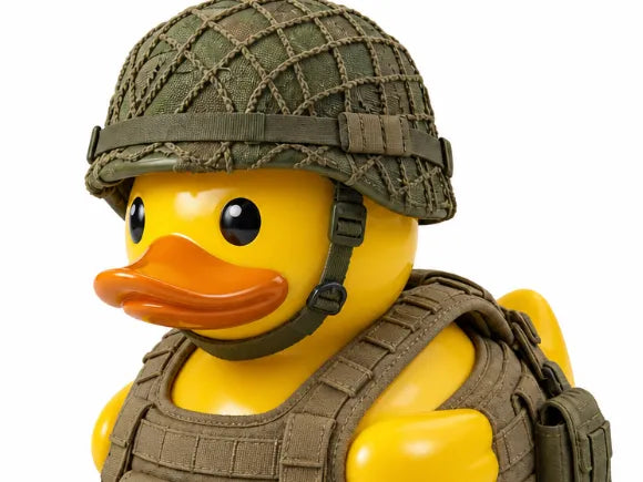 Military Duck - yellow rubber duck wearing netted combat helmet and olive drab tactical body armor