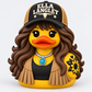 Country glam 3D printed duck with a black and tan trucker hat, wavy brown hair, fringe vest, and turquoise pendant