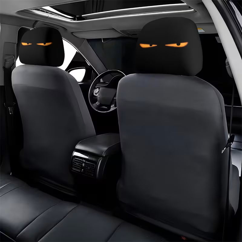 Glowing Eyes Car Headrest Covers – Mischievous Look (Set of 2)